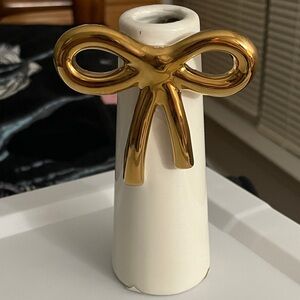 Elegant White Vase with Gold Bow Accent